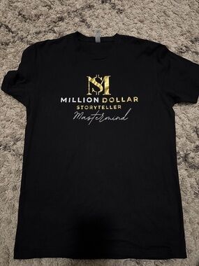 Next Level Apparel Black Tee with Gold 'Million Dollar' Logo